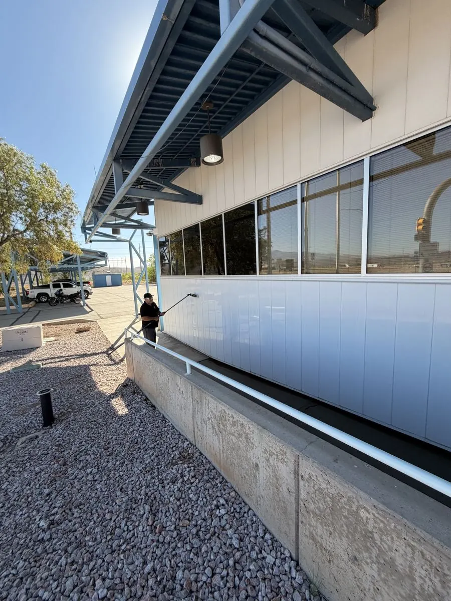 Commercial building window strip cleaned streak-free