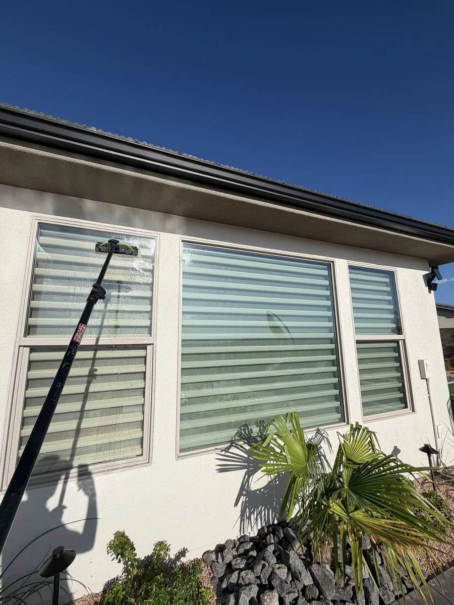 Screen cleaning setup on a backyard patio