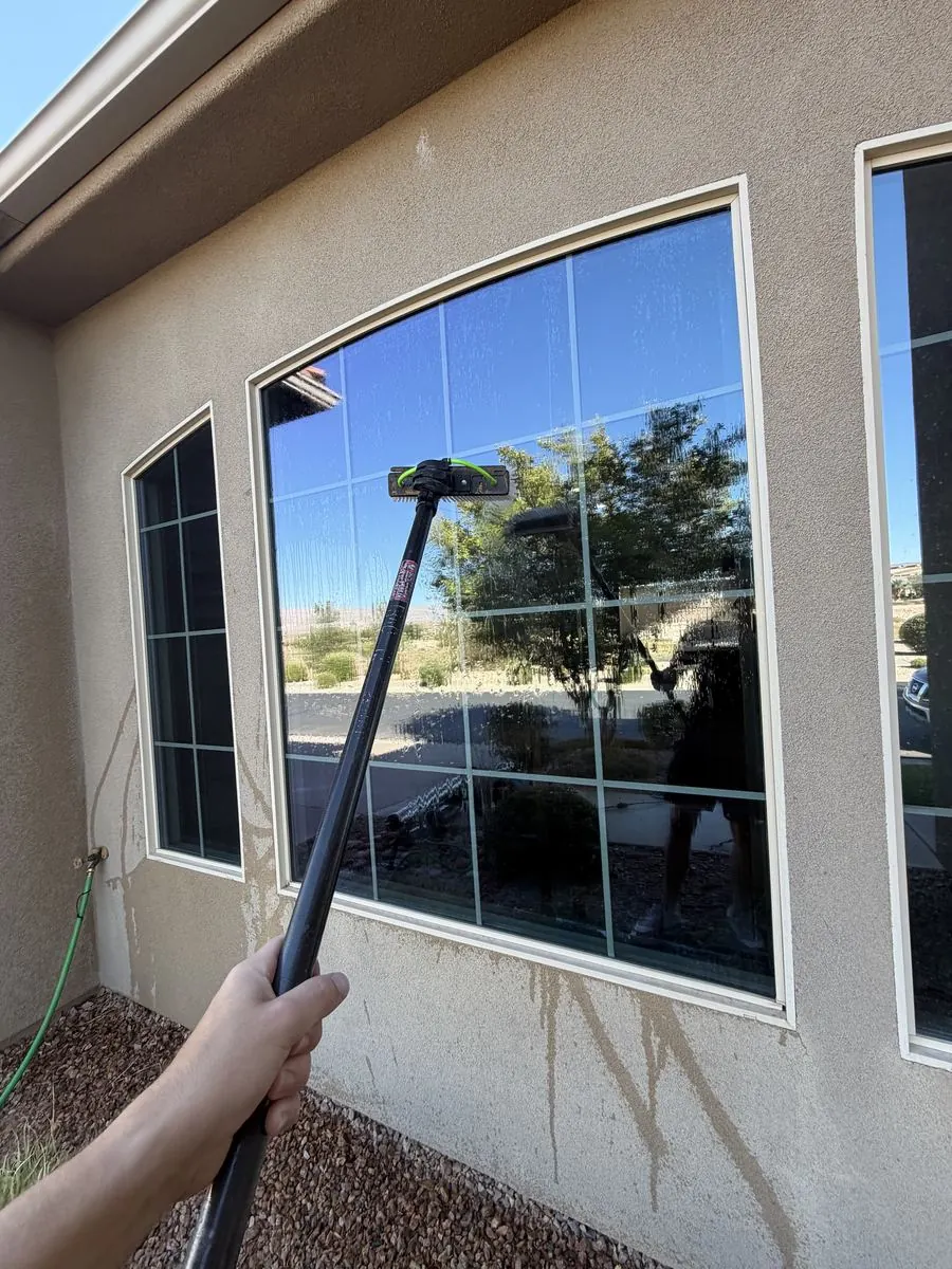 Window cleaned above a driveway view
